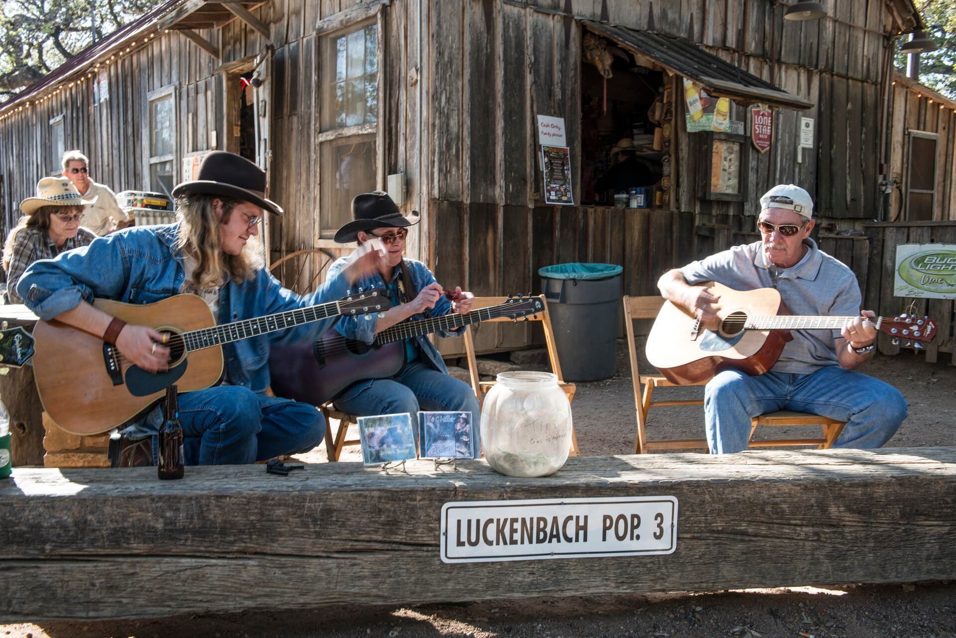 Musicians playing an informal jam session in Luckenbach, Texas