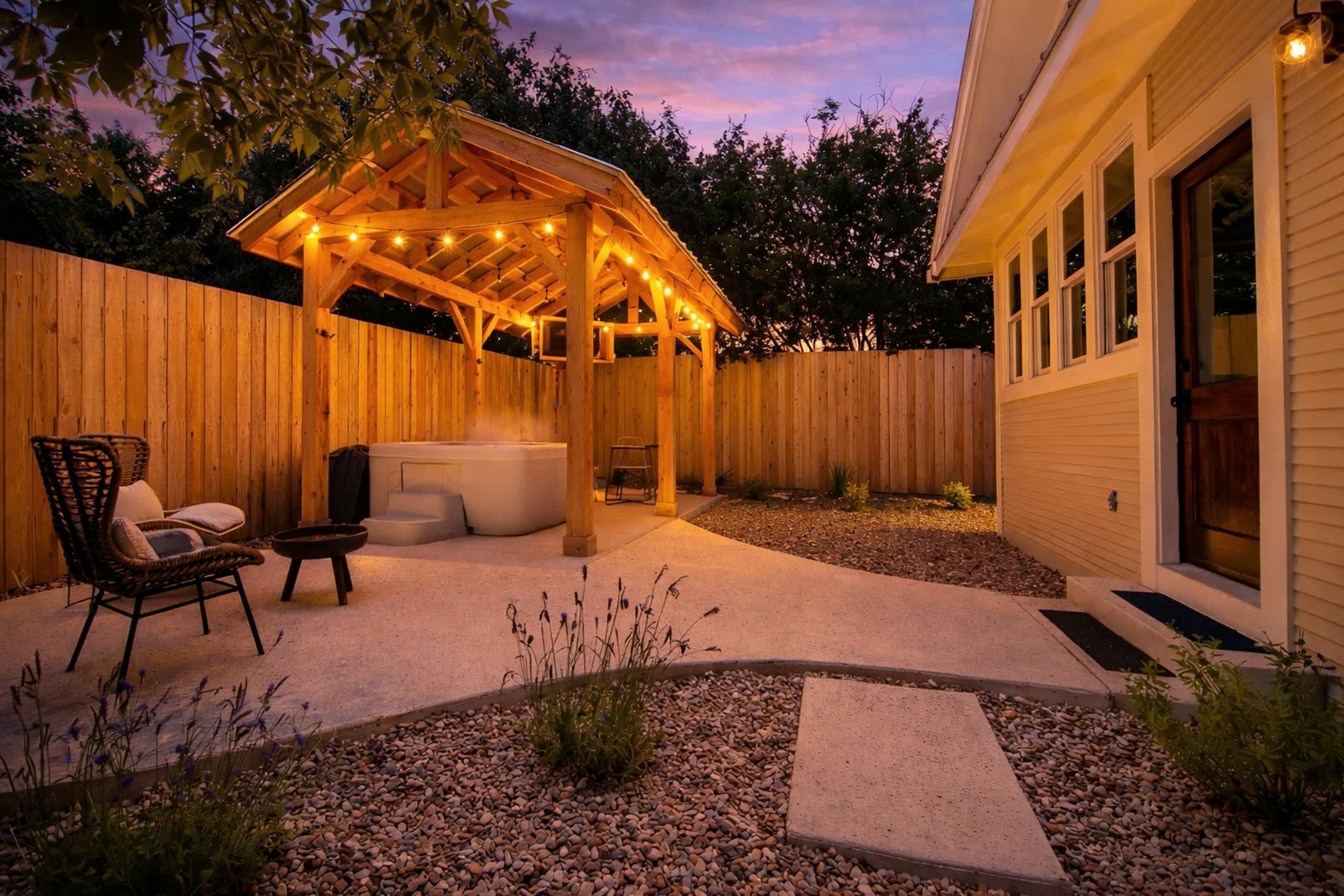 Private hot tub pavilion at The Max at dusk